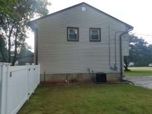 House with mildew on siding after soft washing with Hydro Eco Clean